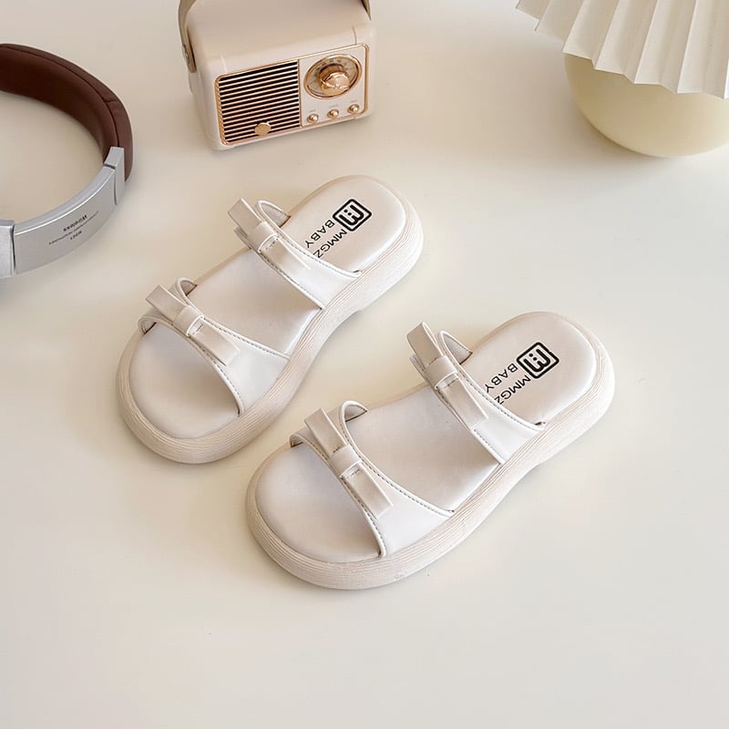 V2261 - Dép MG baby 2 quai đính nơ 2 màu đen/kem bé gái size 26-35