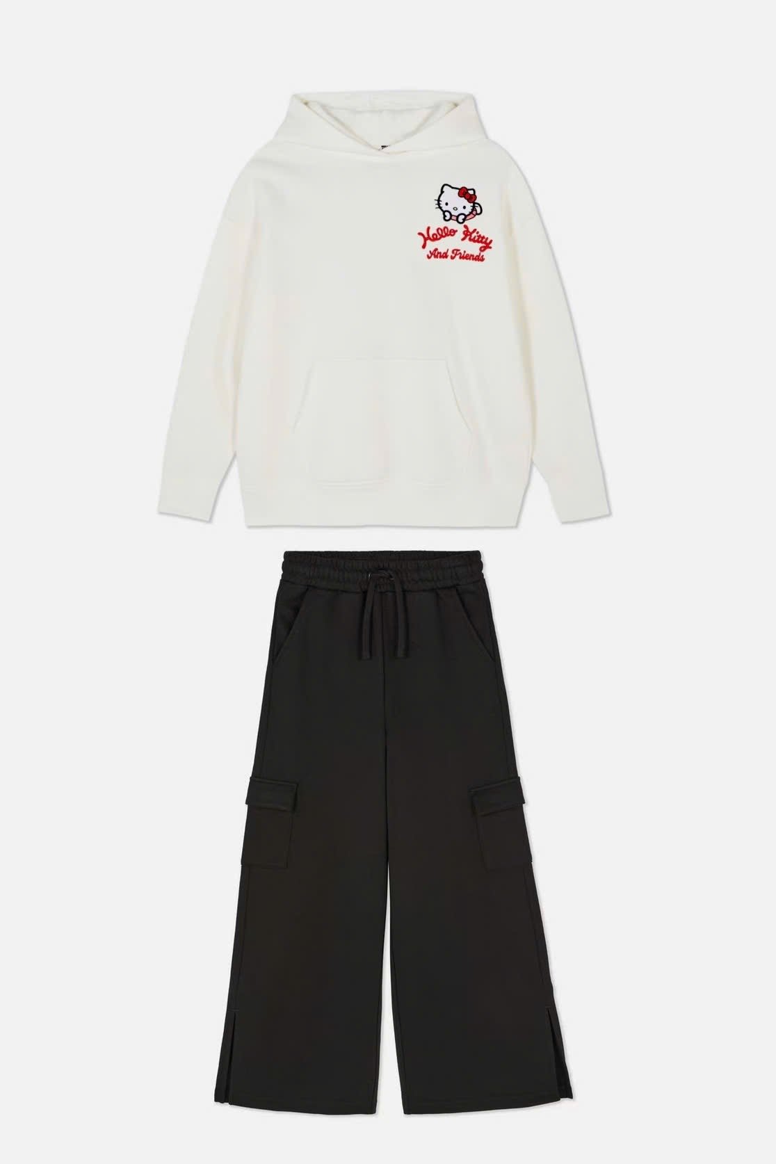 Bộ nỉ bông Primark dòng Đại áo trắng Hello Kitty - quần ống xuông đen size 8 - 15y
