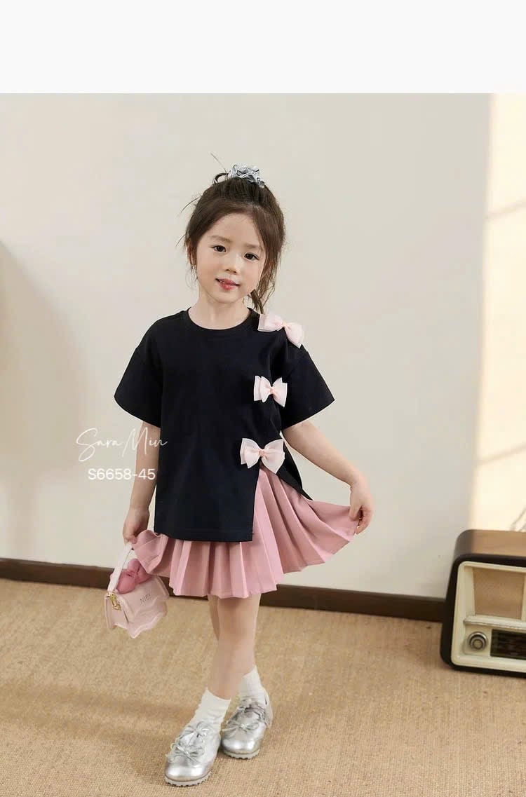 S6658 - Set Sara Min áo thun đen đính nơ hồng - chân váy xếp li hồng size 2 - 12y