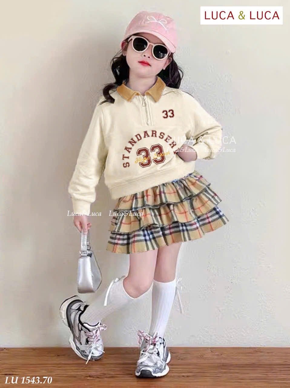 LU 1543 - Bộ LUCA áo be cổ đức + chân váy kẻ BBR liền quần bé gái size 2-12y