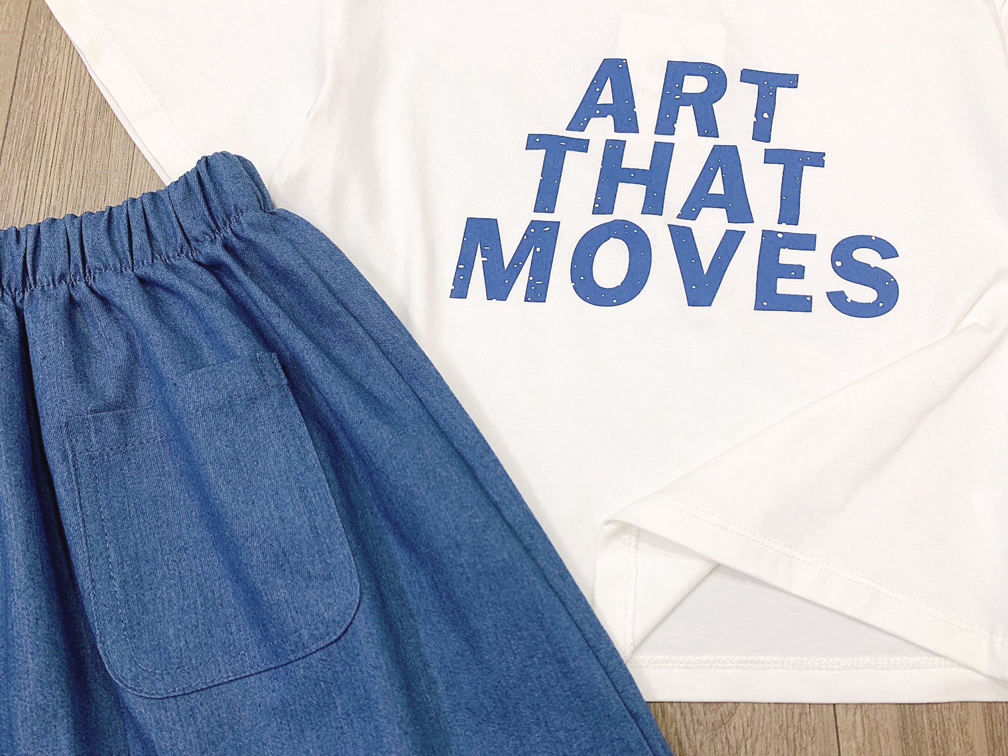 Bộ Melisa áo trắng in chữ + chân váy xanh jean BG size 3-12y