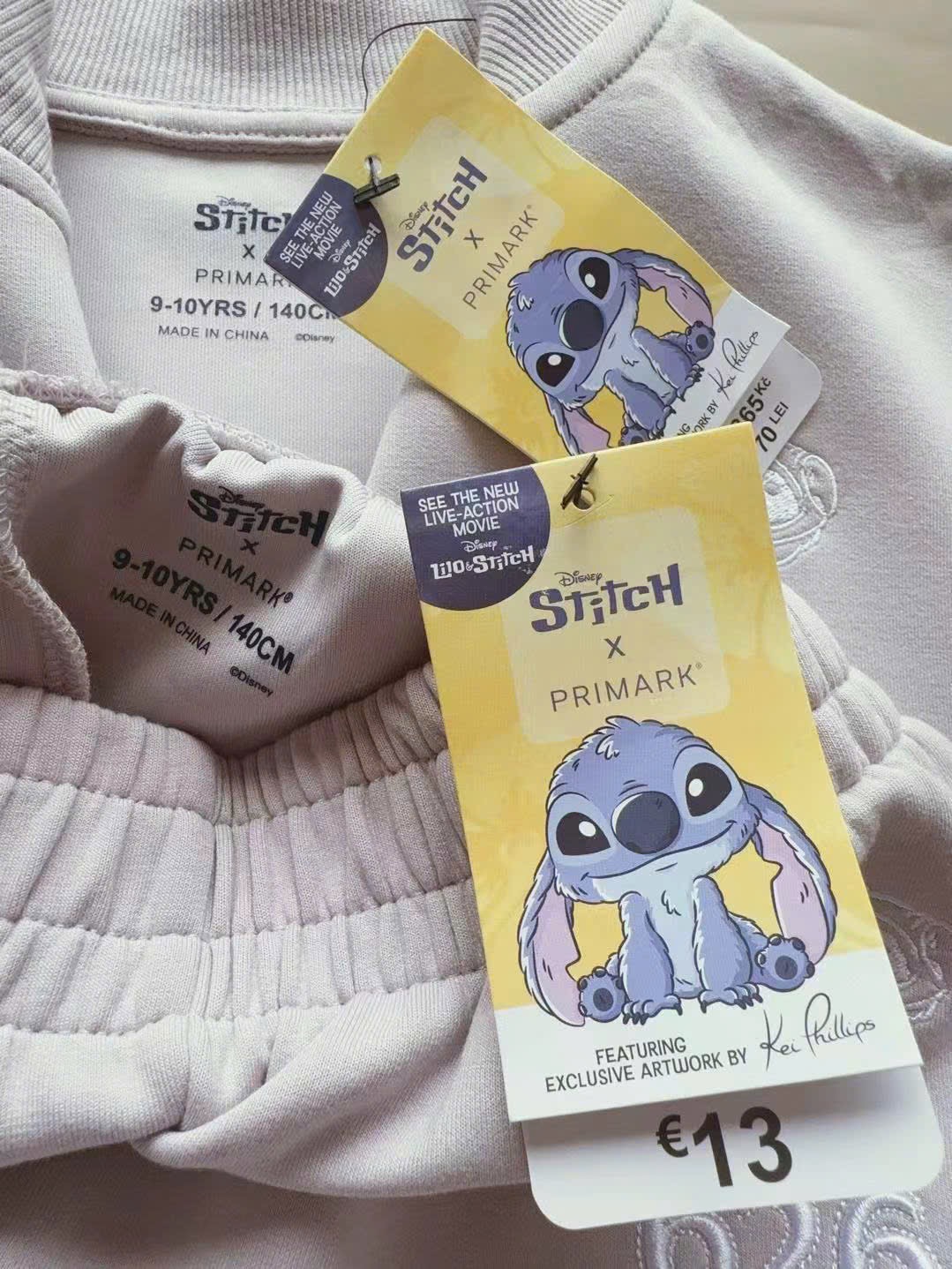 Bộ nỉ thể thao Pri.mark màu tím lilac Stitch cho bé gái size 7-15y