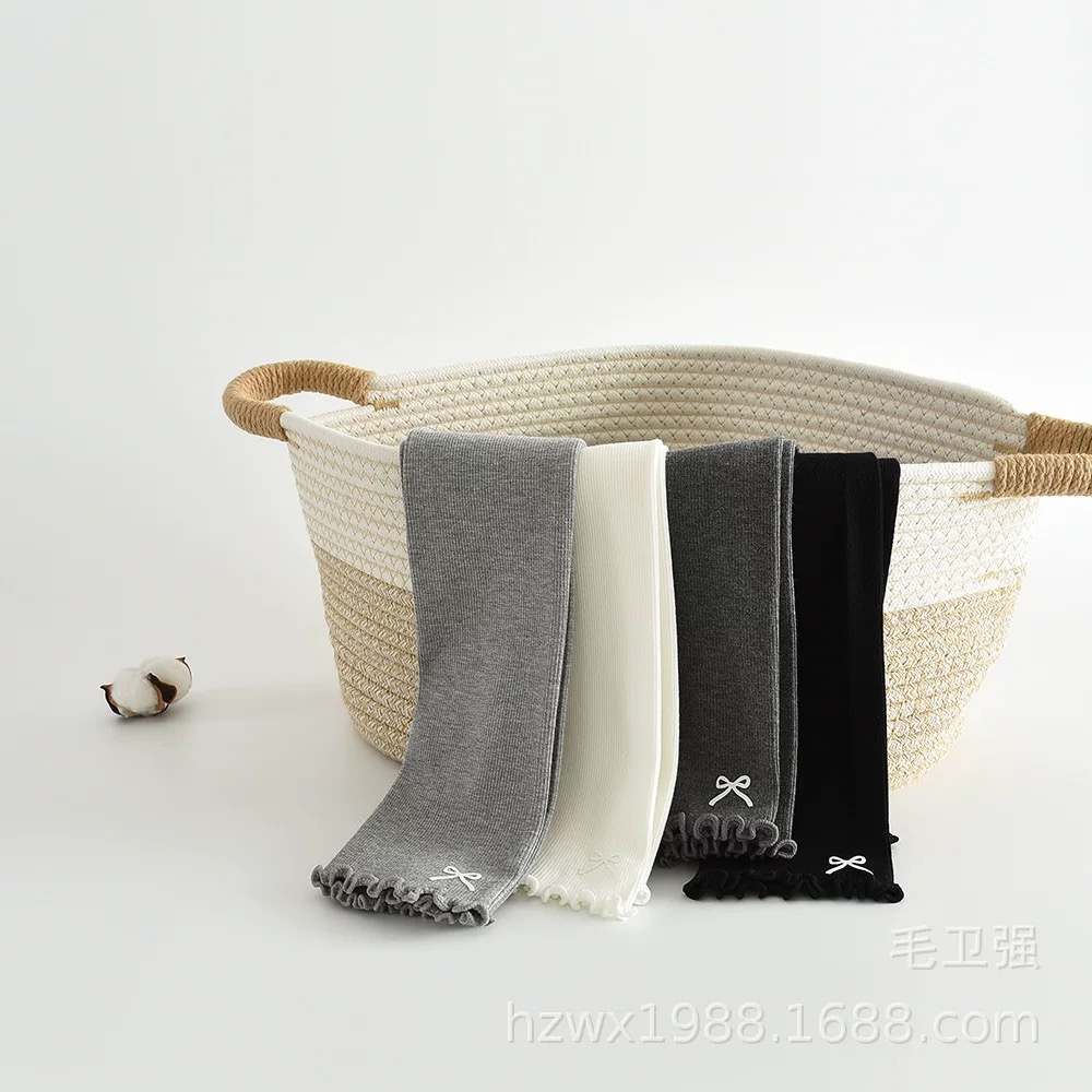 Quần len không bàn đính nơ gấu cho bé gái size 90-135cm