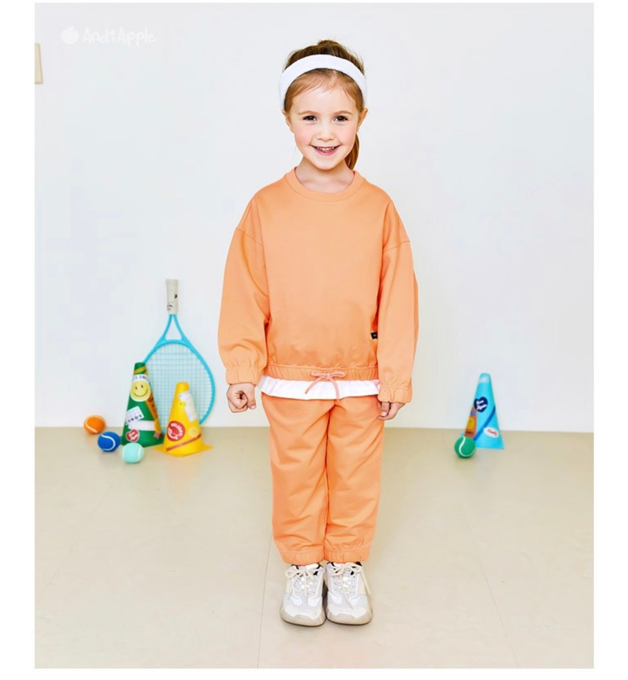 Áo nỉ da cá AndiApple màu cam bo gấu (không kèm nơ đính gấu)