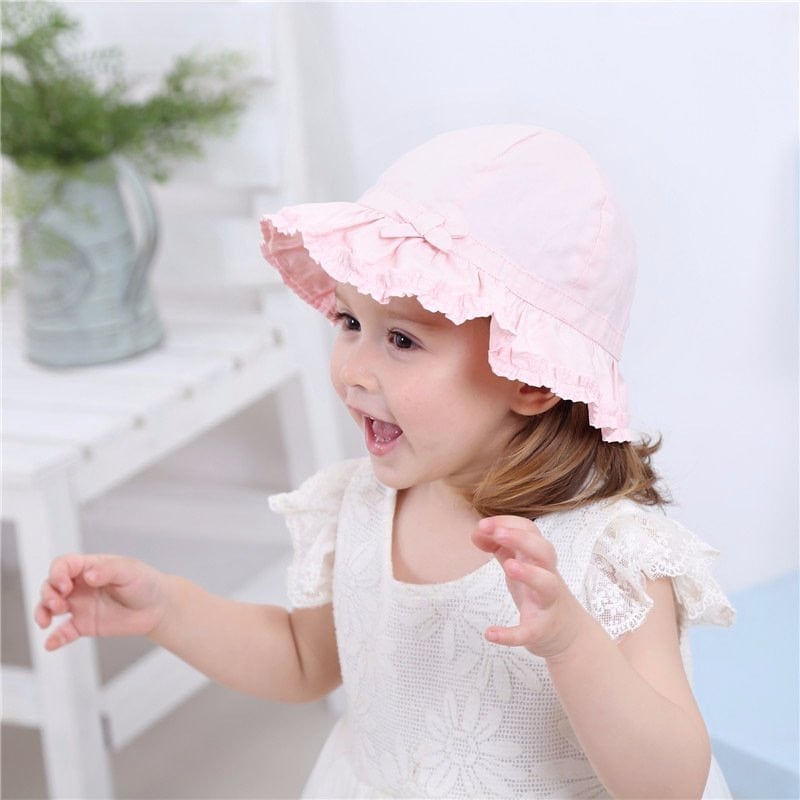 Mũ vải vành Miller màu hồng cam trơn đính nơ