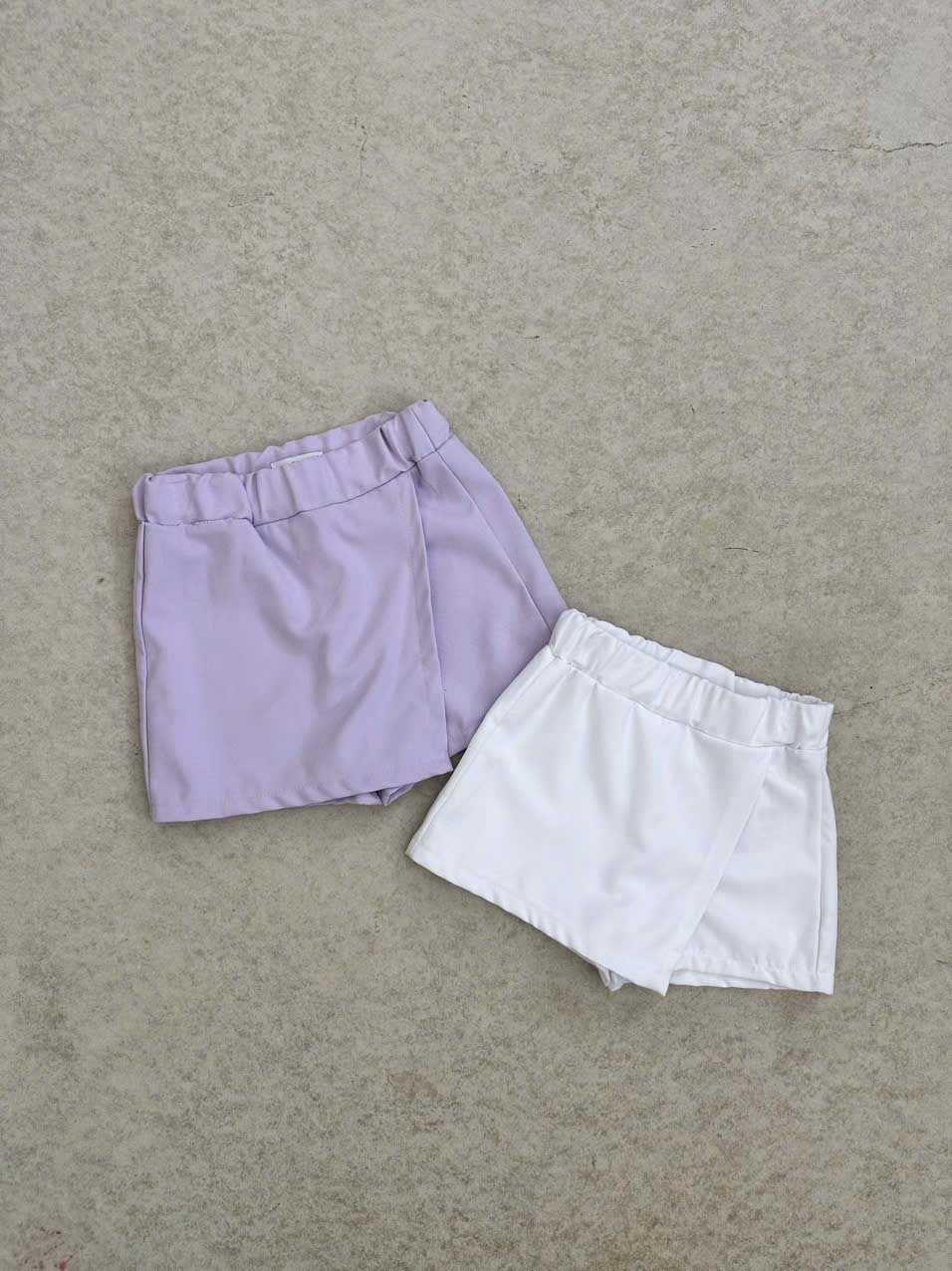 Quần váy GGJJ dư xịn 2 màu tím/trắng bé gái size 2-8y