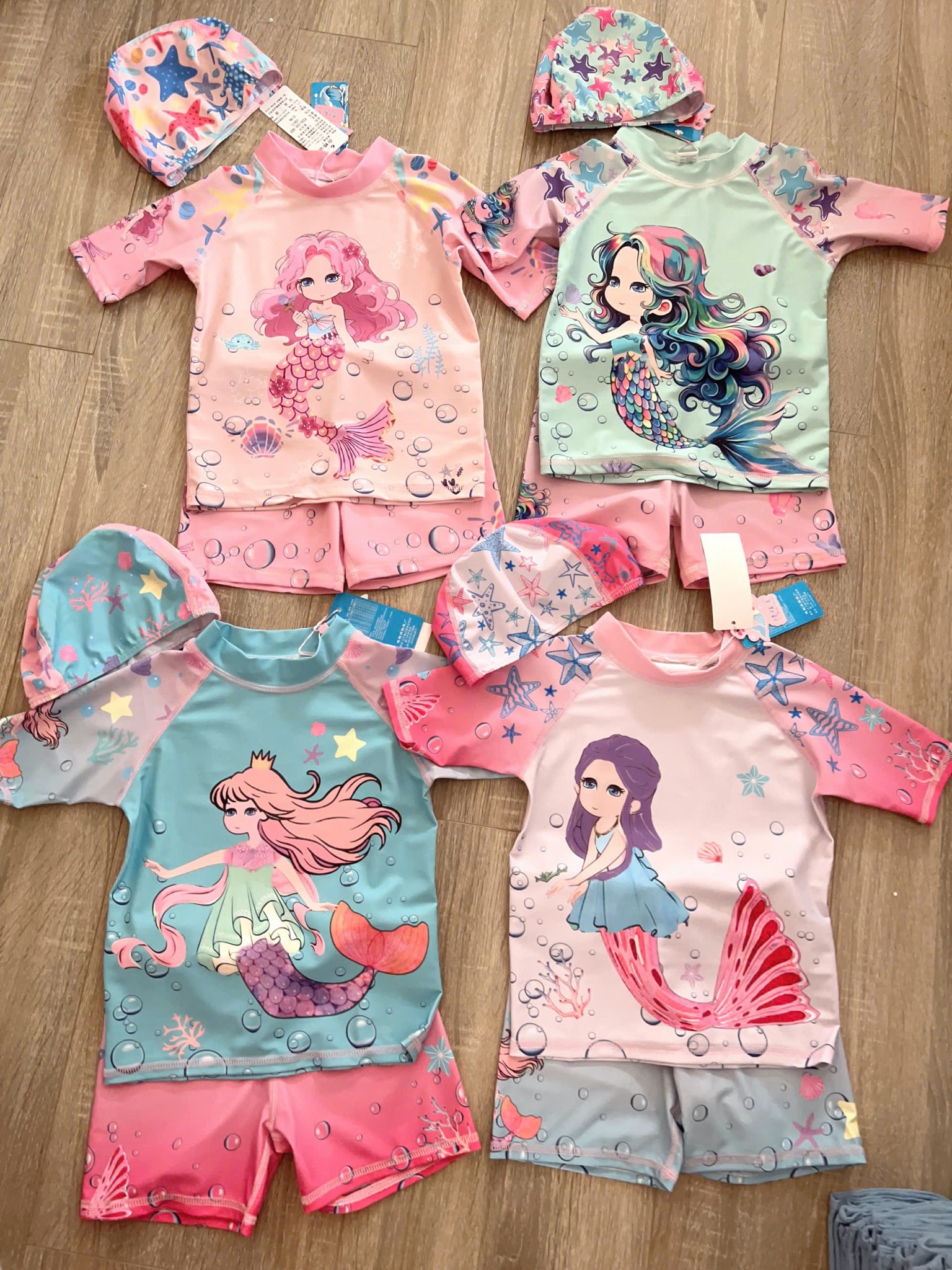 Bộ bơi 3ct kèm mũ hoạ tiết tiên cá nhiều màu cho bé gái size 90-140