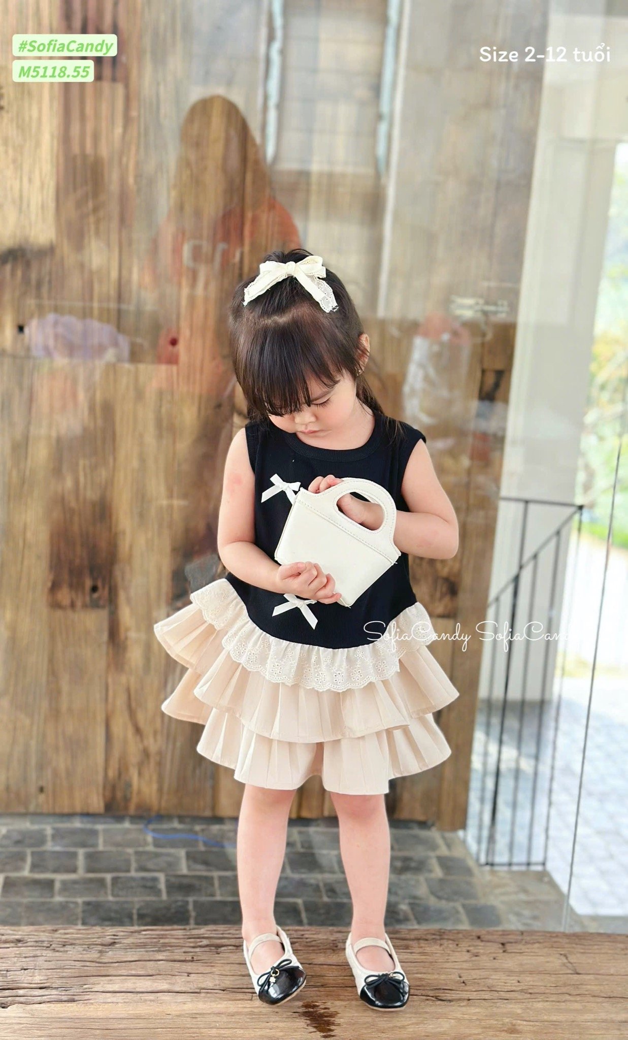 M5118 - Set bộ Mia Kids áo nơ đen phối chân váy tầng màu be size 2-12y