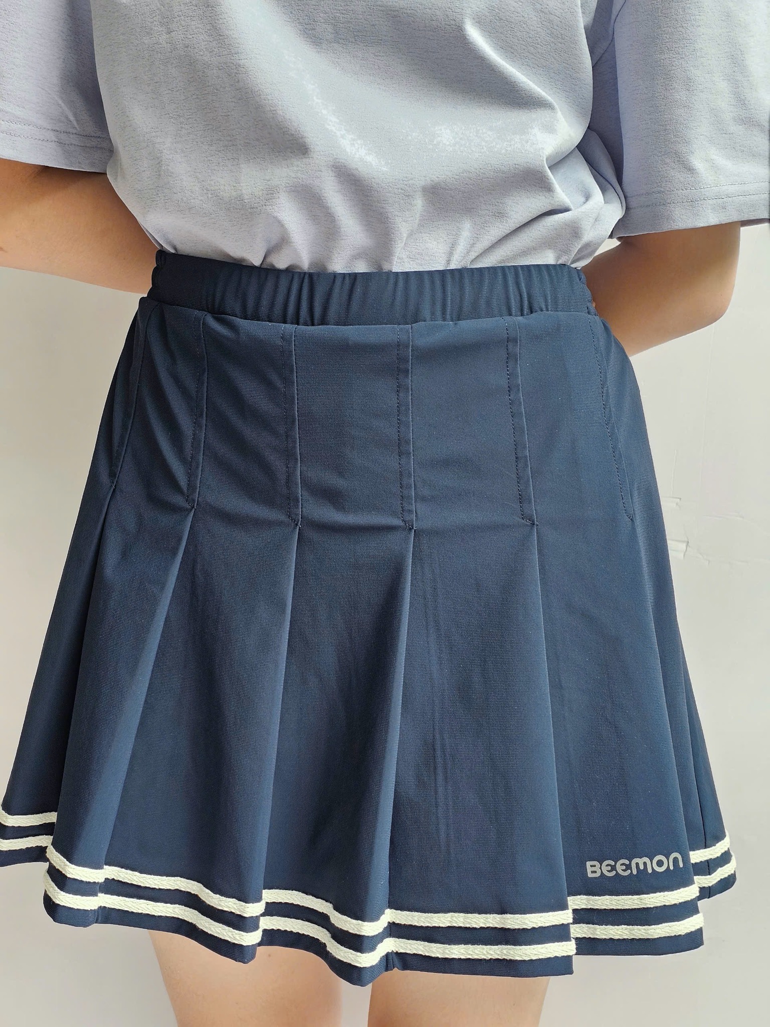 Chân váy Beemon xếp ly viền kẻ cho bé gái 2 màu đen/navy size 120-160