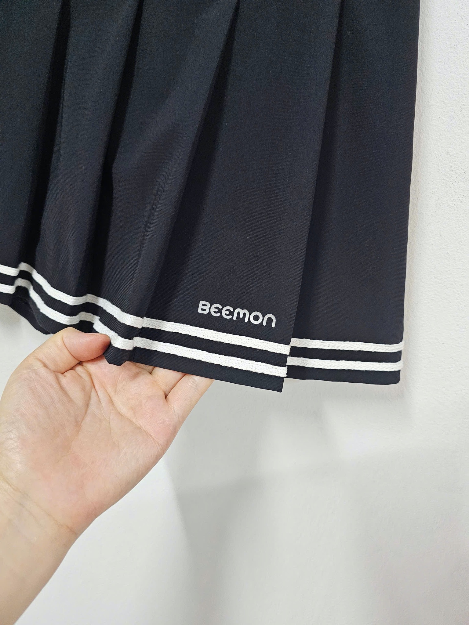 Chân váy Beemon xếp ly viền kẻ cho bé gái 2 màu đen/navy size 120-160