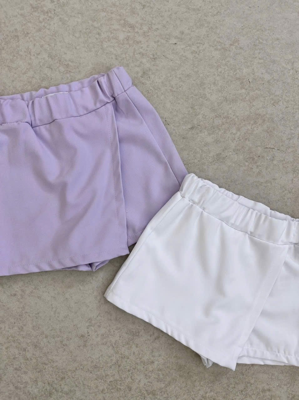 Quần váy GGJJ dư xịn 2 màu tím/trắng bé gái size 2-8y