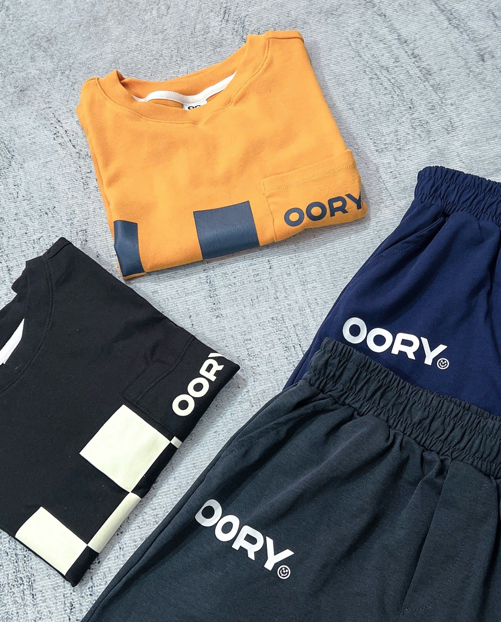 Bộ thun Oory kẻ caro 2 màu đen, cam cho bé size 130-170