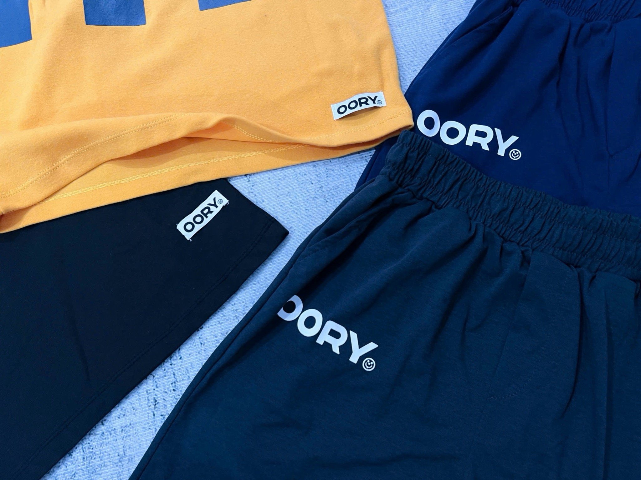 Bộ thun Oory kẻ caro 2 màu đen, cam cho bé size 130-170