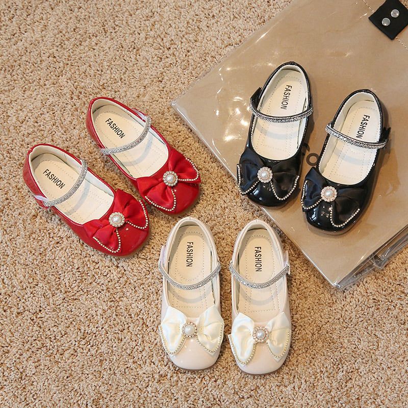 V550 - Giày búp bê đính nơ quai dán 2 màu đen/kem cho bé size 21-36