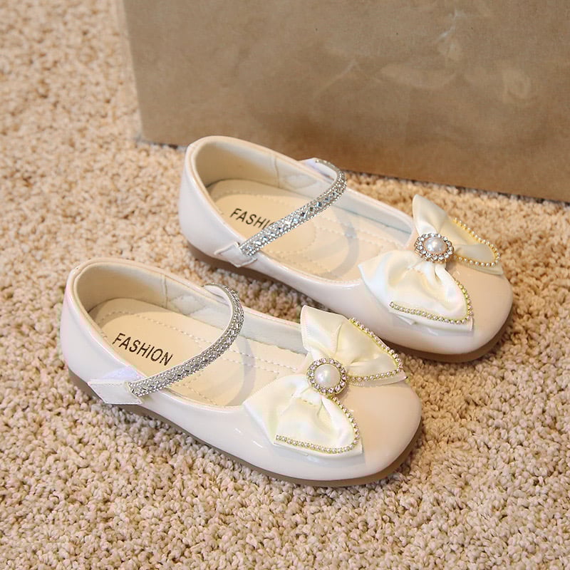 V550 - Giày búp bê đính nơ quai dán 2 màu đen/kem cho bé size 21-36