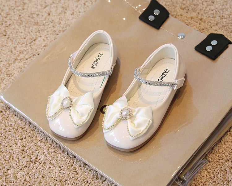 V550 - Giày búp bê đính nơ quai dán 2 màu đen/kem cho bé size 21-36