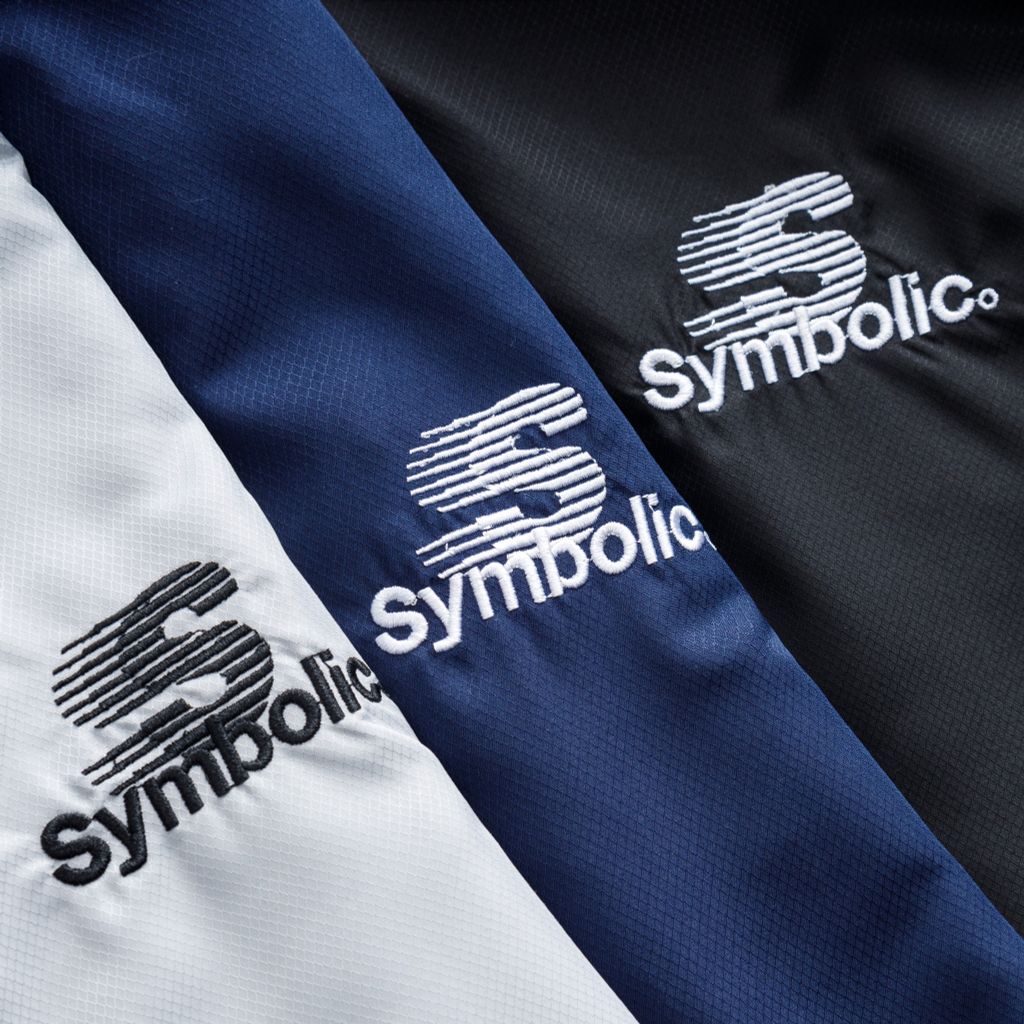 Áo khoác dù nhẹ chống nắng Camping Jacket Symbolic giấu nón