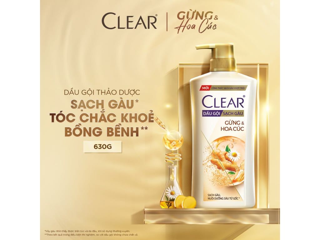 Dầu Gội Thảo Dược Gừng & Hoa Cúc Nuôi Dưỡng Da Đầu Từ Gốc, Sạch Gàu Và Giảm Gãy Rụng Clear 630g