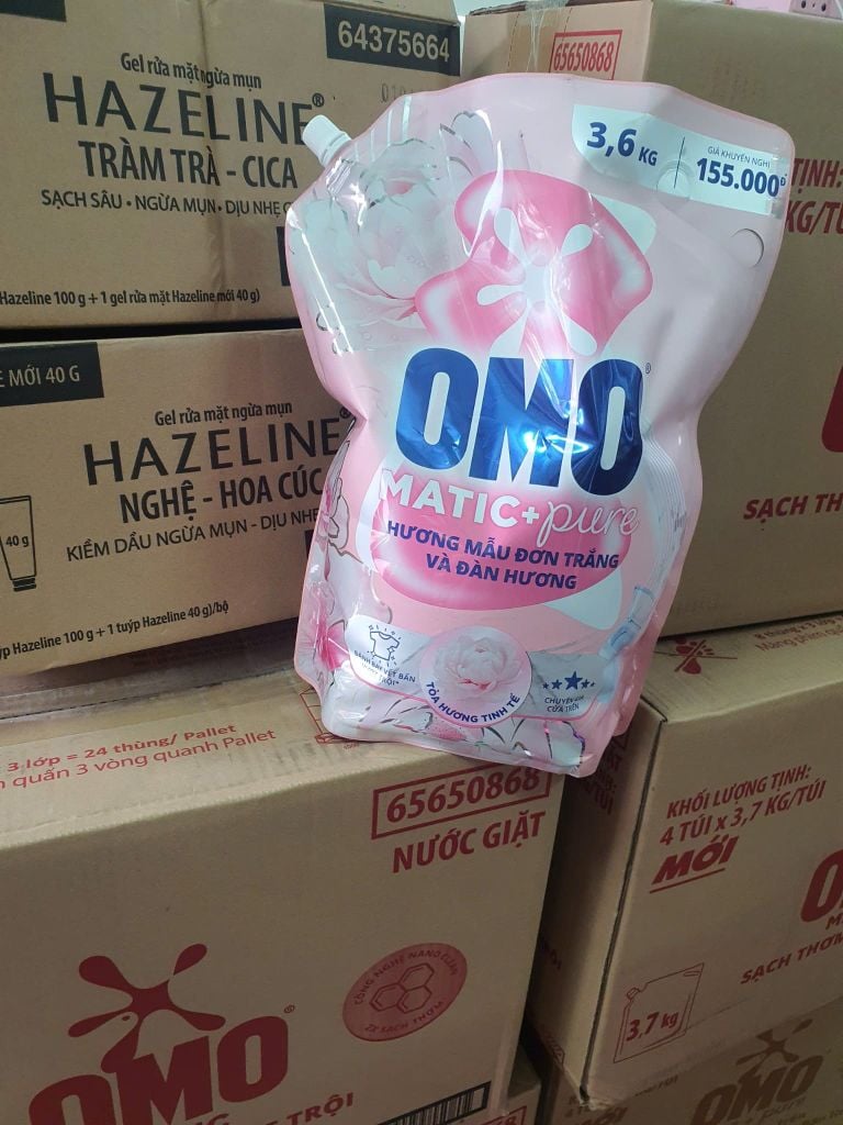 Nước giặt OMO Cửa Trên hương Mẫu Đơn Trắng và Đàn Hương 3.6kg