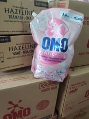 Nước giặt OMO Cửa Trên hương Mẫu Đơn Trắng và Đàn Hương 3.6kg