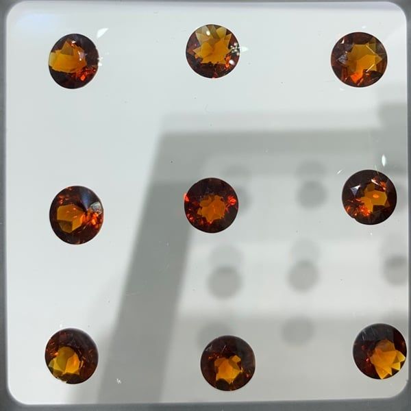  Đá Garnet - Tròn vàng đậm 6.9ly-0.9ct 