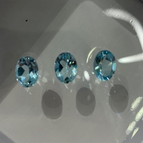  Đá Topaz - Oval 5.9x7.8 ly-1.5ct 