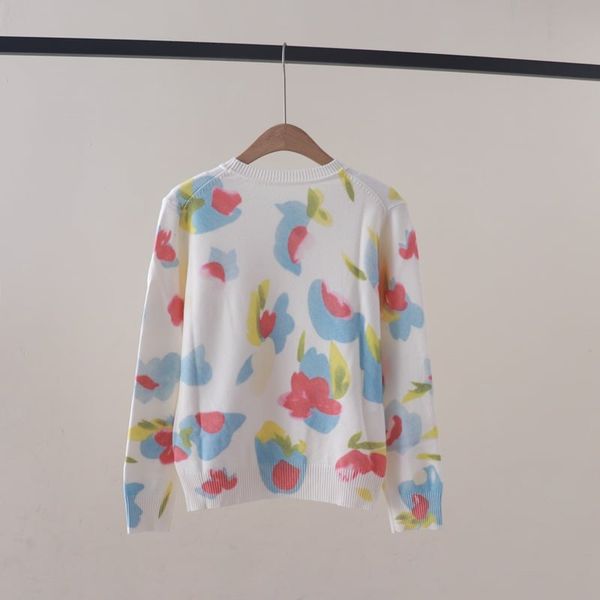  A838- Áo len dài tay cổ tròn in hình bướm 