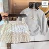 MLS 5824 - Bộ nỉ Melisa áo ghi nơ + chân váy xếp ly chấm bi bé gái size 2-12y