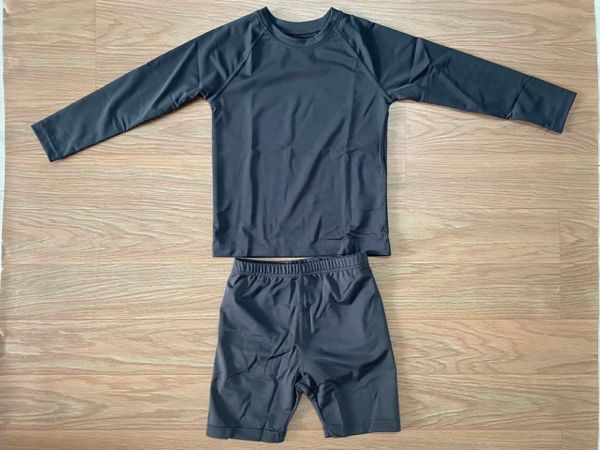 DB00002 - Bộ bơi trơn nhiều màu dài tay chống nắng cho bé size 110-150 (1 số thay tag)