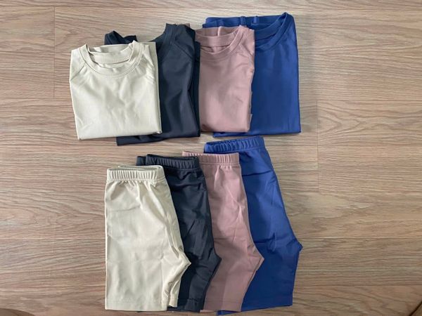 DB00002 - Bộ bơi trơn nhiều màu dài tay chống nắng cho bé size 110-150 (1 số thay tag)