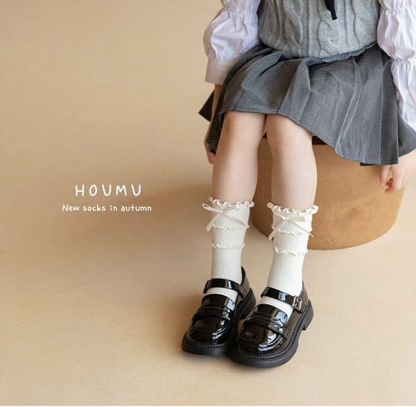 PK06 - Tất cao cổ bèo đính nơ 2 màu trắng/đen