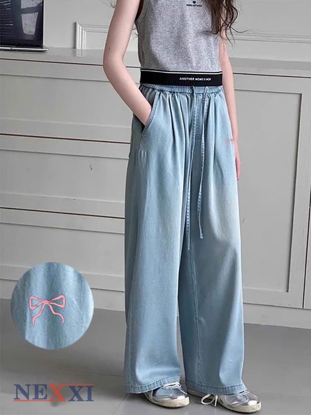 2604.22 - Quần jean giấy Nexxi dài ống suông thêu nơ hồng bé gái size 11-16y