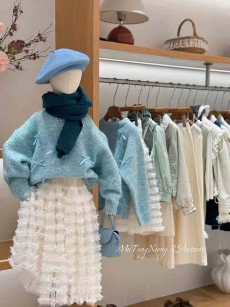 AK39 - Áo len QC Tongnono màu xanh đính nơ bé gái size 110 - 150