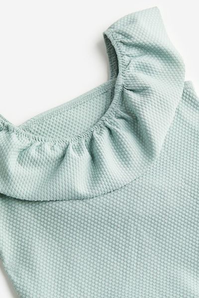 DB00017 - Bộ bơi liền tổ ong bèo vạt 3 màu hồng nhạt / mint / hồng đất size 6m - 4y