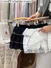 A793 - Chân váy QC voan xếp tầng liền quần 2 màu trắng/đen bé gái size 90-130