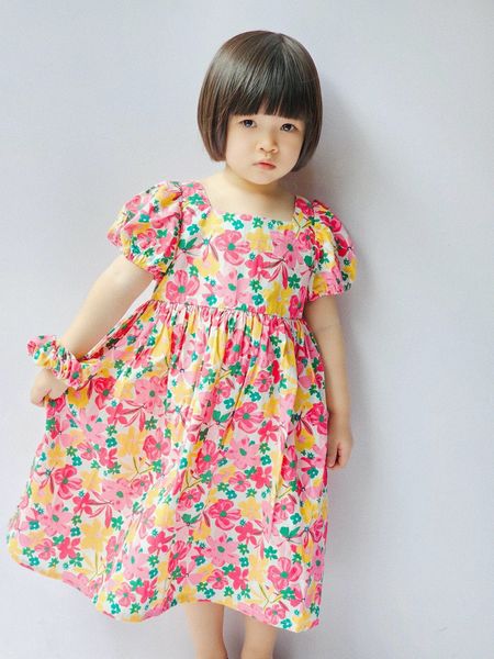 V00025 - Váy thô hoa đỏ kèm chun buộc tóc size 110-150