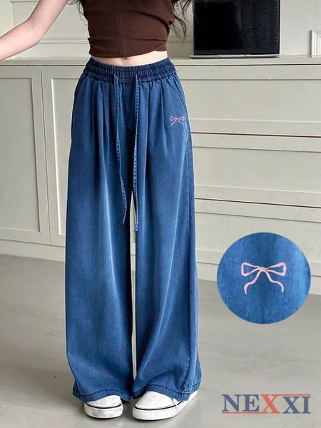 2604.22 - Quần jean giấy Nexxi dài ống suông thêu nơ hồng bé gái size 11-16y
