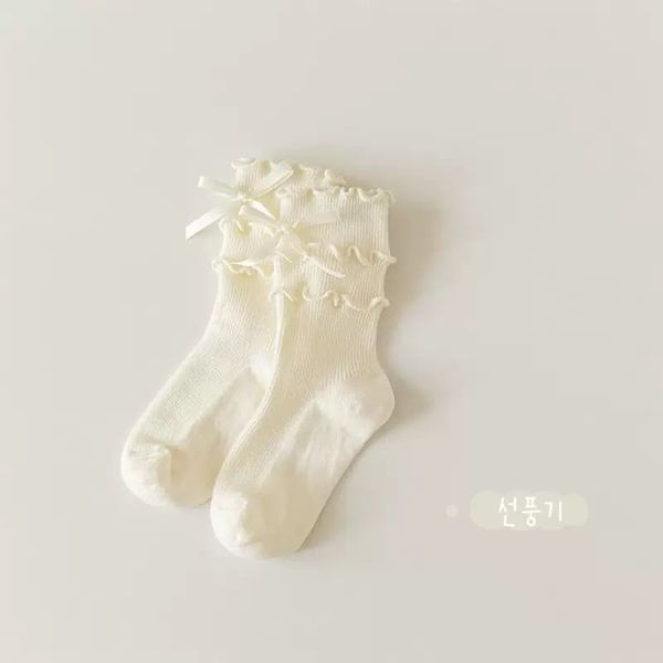 PK06 - Tất cao cổ bèo đính nơ 2 màu trắng/đen