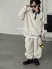 D312 - Bộ nỉ hai da cổ đức tay phối hai màu đen/be bé trai size 120-160