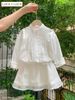 Lu 1406 - Bộ Luca áo + chân váy trắng phối ren bé gái size 2-12y