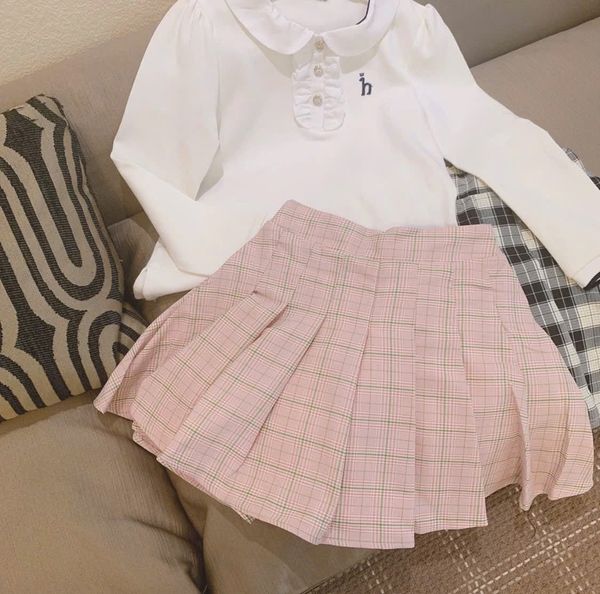 CVAY15 - Chân váy vải thô Mini Peace kẻ caro liền quần nỉ bé gái size 110-160