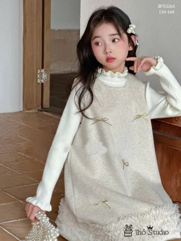 5261 - Set 2ct áo len tăm + váy dạ lót lông màu kem đính nơ bé gái size 120-160