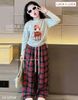 Lu 1678 - Bộ Luca bé gái áo ghi in thỏ + quần kẻ size 6-12y