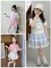 SH2603BBG01 - Set bộ áo cotton + chân váy tầng cho bé size 90-160