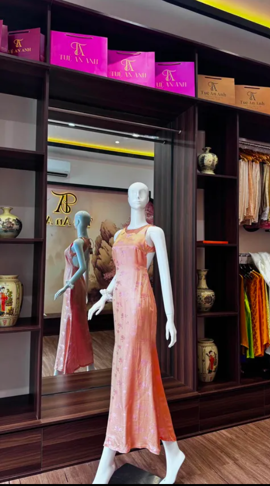 Đầm thiết kế cam