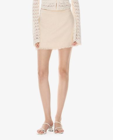  GIGI - Chân váy chữ A mini viền tua rua 