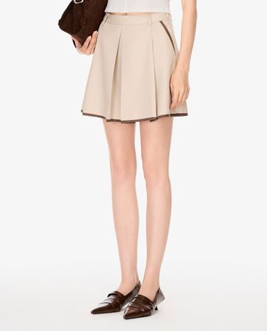  GIGI - Chân váy xếp li mini dáng xòe 