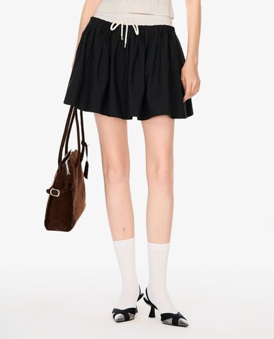  GIGI - Chân váy chữ A mini lưng thun dáng xòe 