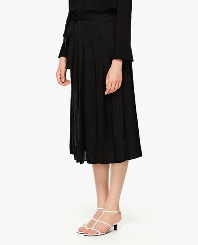  GIGI - Chân váy xếp li midi phối dây thắt nơ 