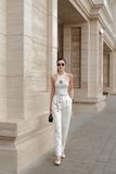  ÁO TRẮNG SỌC VÀNG THUN SÁT NÁCH + HOA VÀNG.   Golden Chain Knit Halter – A115419 